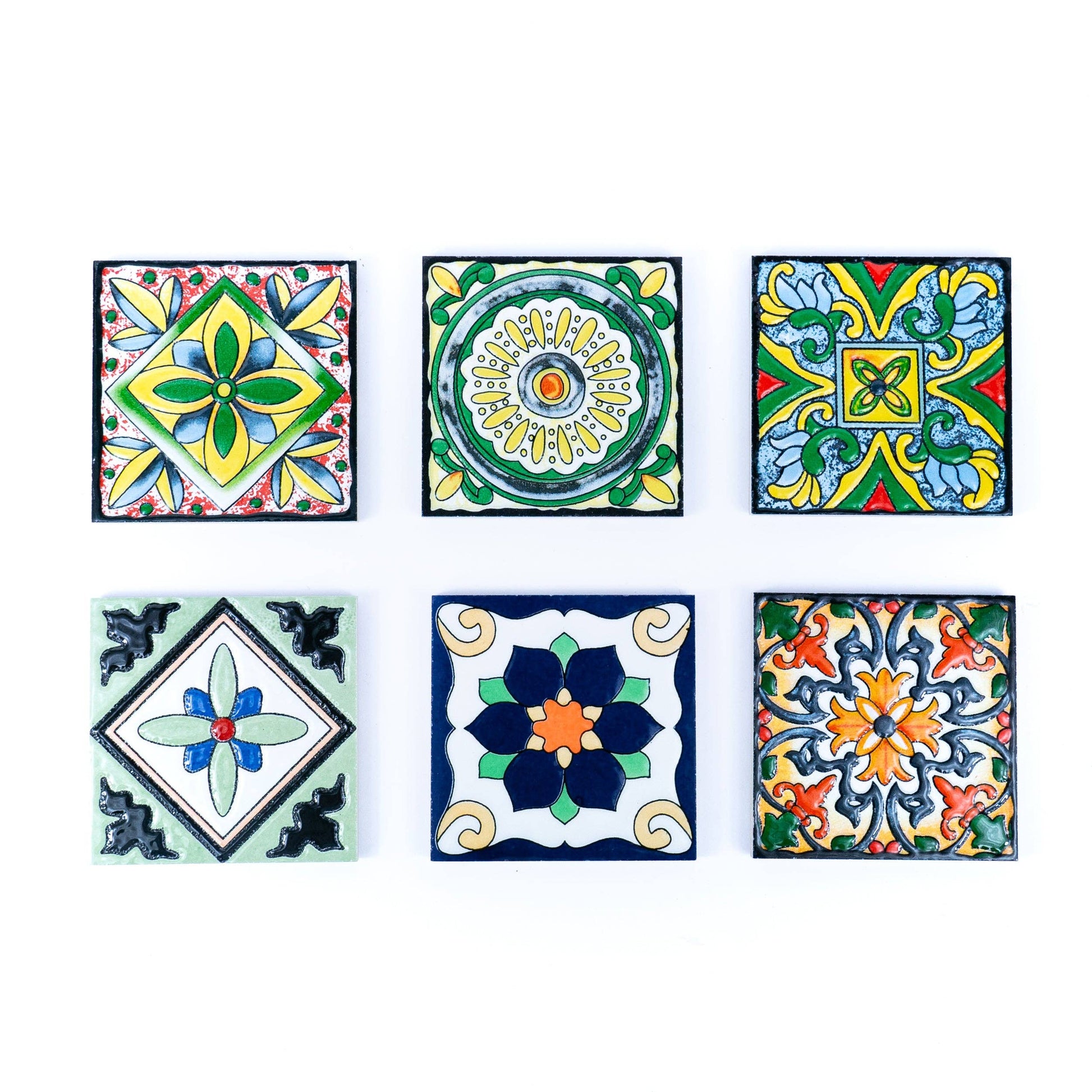 The Meninas Bonitas Cork Tile-Inspired Ceramic & Cork Coasters set includes 6 coasters, each featuring unique, vibrant floral and geometric patterns in colorful tones inspired by Portuguese tiles.