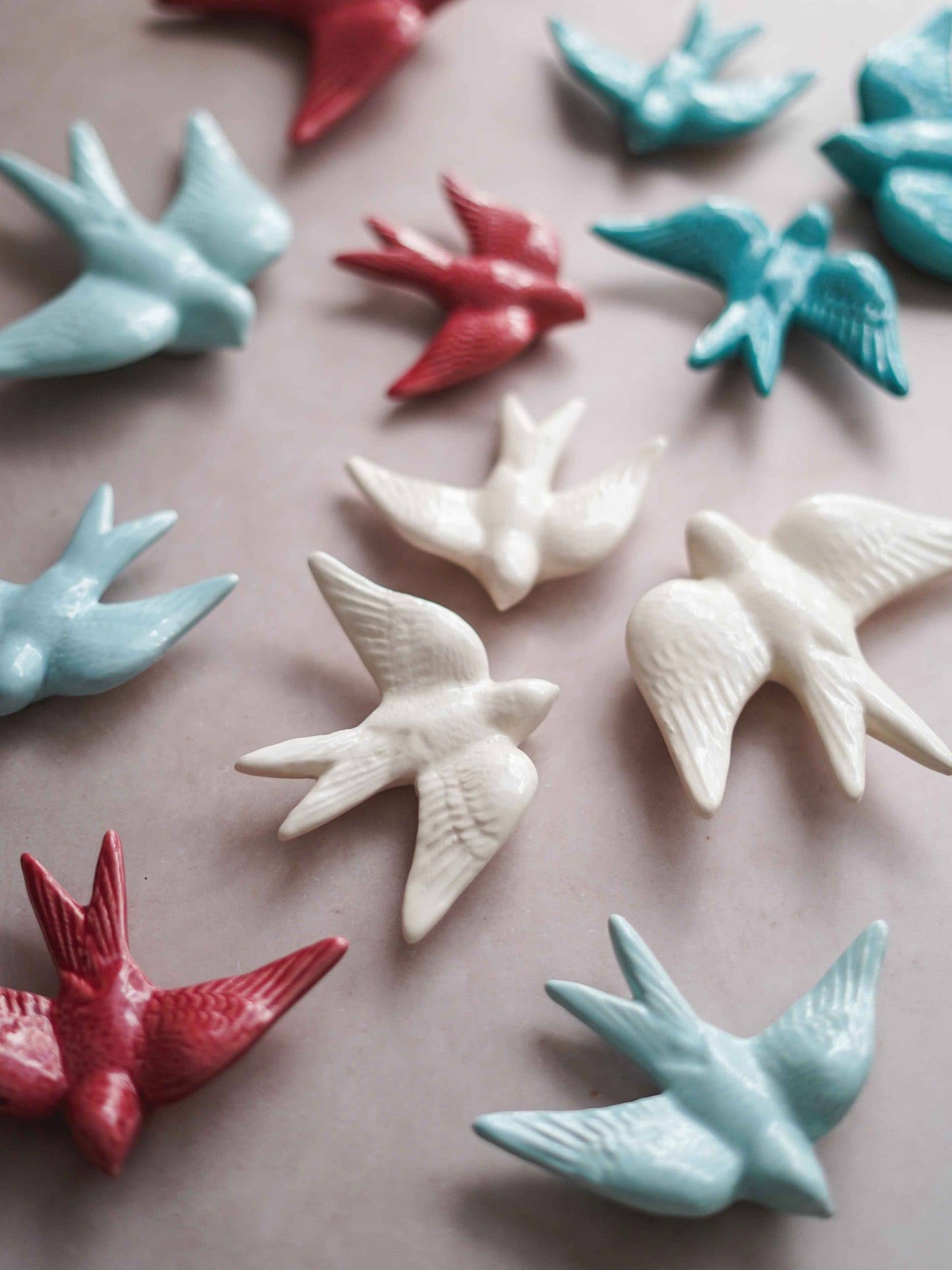 handpainted spring swallows made from ceramic
