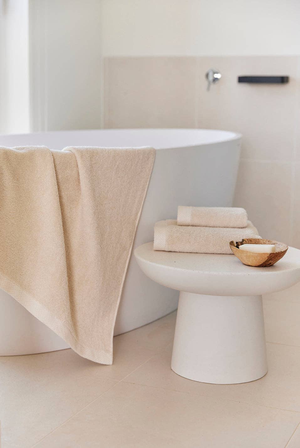 Image of Natural Torres Novas X Zero guest towel in a bathroom setting