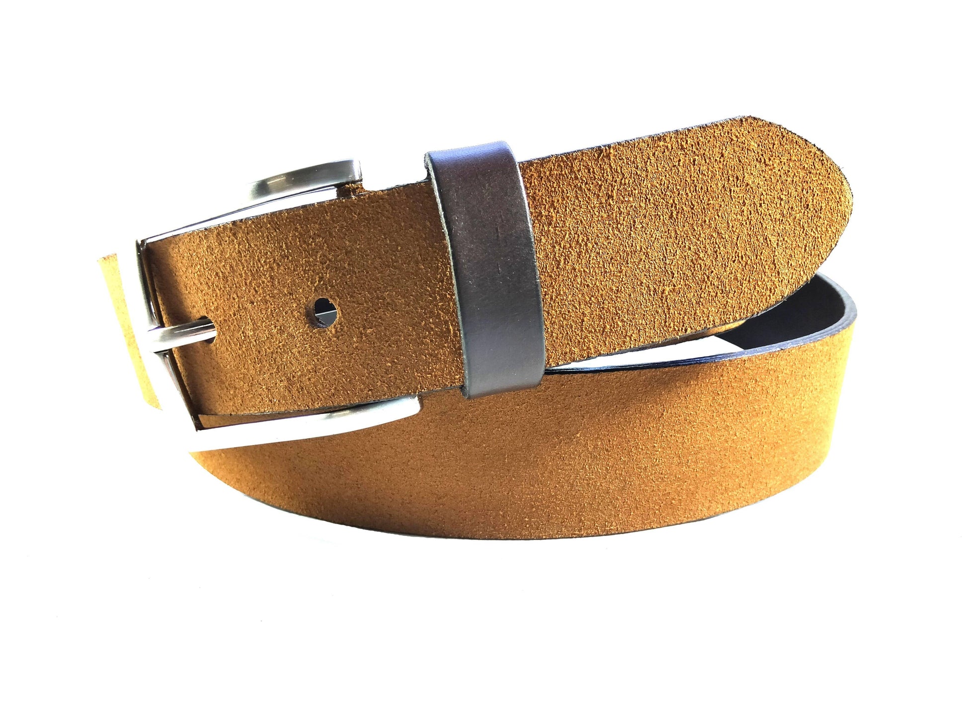 The Creaciones Corpas 3.5cm Nubuck Leather Belt in brown features a shiny Zamak buckle, coiled loosely on a white background.