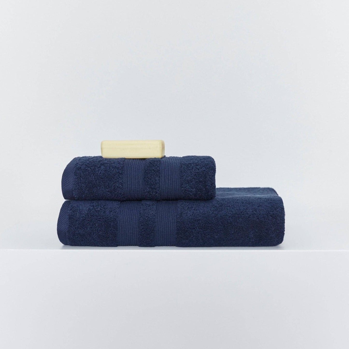 Close-up of plush terry texture on cobalt blue towel.