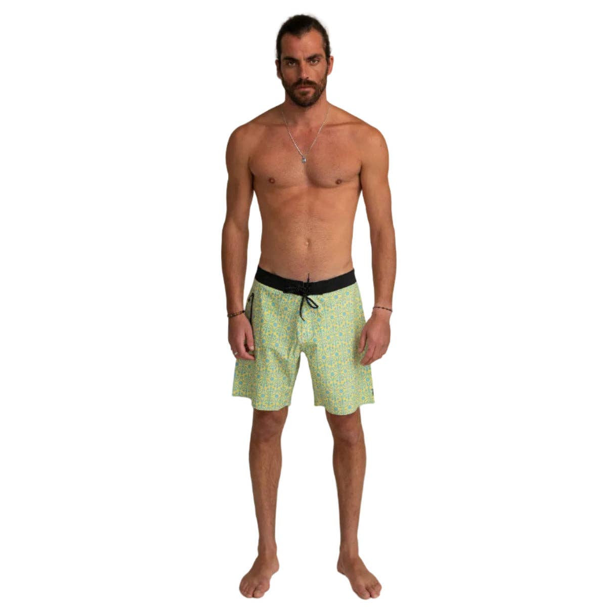 Man wearing Futah Flora Yellow Boardshorts with black waistband and drawstring