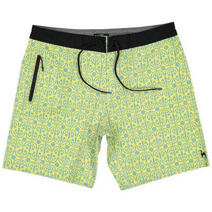 Futah Flora Yellow Boardshorts with green and yellow geometric print, black waistband and zipped pocket