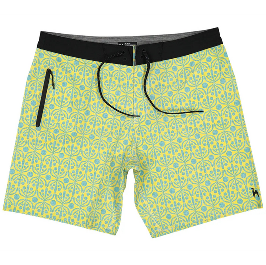 Futah Flora Yellow Boardshorts with green and yellow geometric print, black waistband and zipped pocket