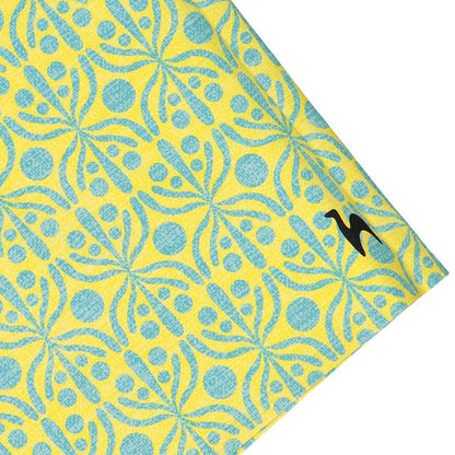 Yellow and blue-green geometric Flora print detail from Futah Portuguese beachwear