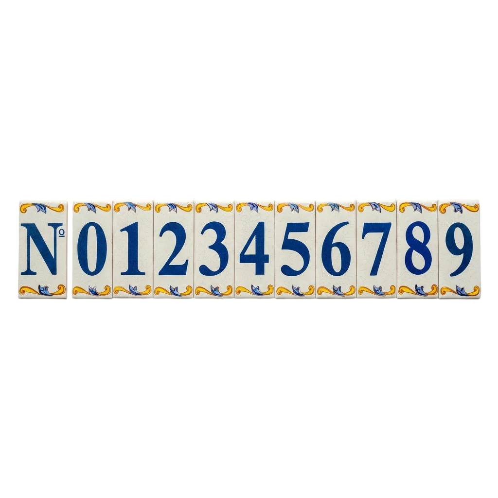Lisa Croquets Numbers – Ceramic House Number Tiles from LVR Ceramics featuring the number symbol and digits zero through nine in blue, each decorated with blue and yellow scrollwork borders and handcrafted in Spain.