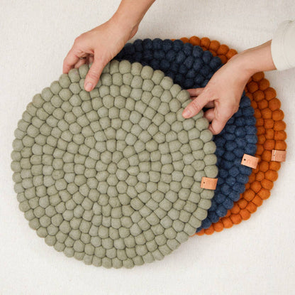 Pipa handcrafted felt seat pads in neutral, navy and honey