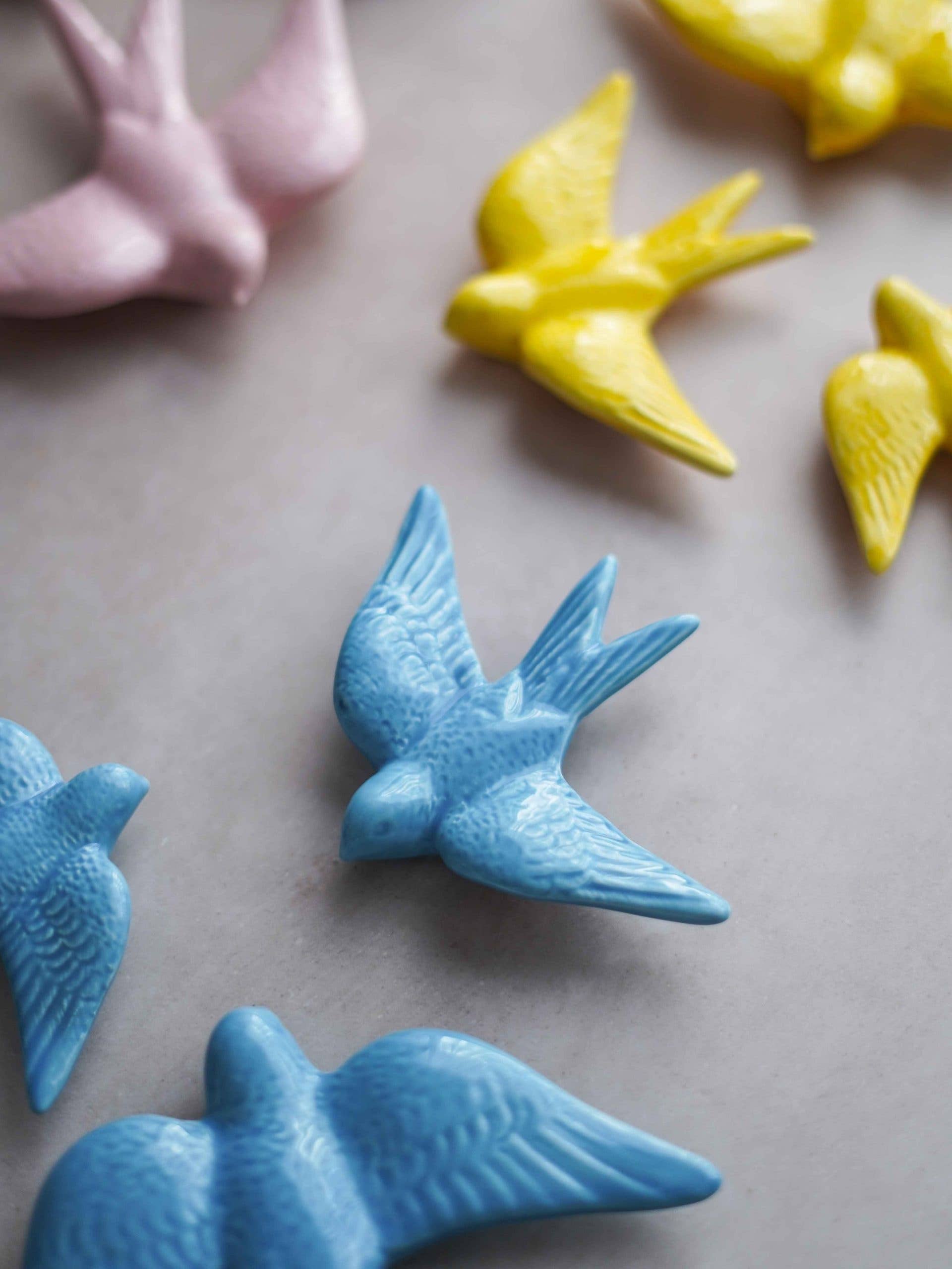 handpainted ceramic swallow birds in yellow blue rose colours